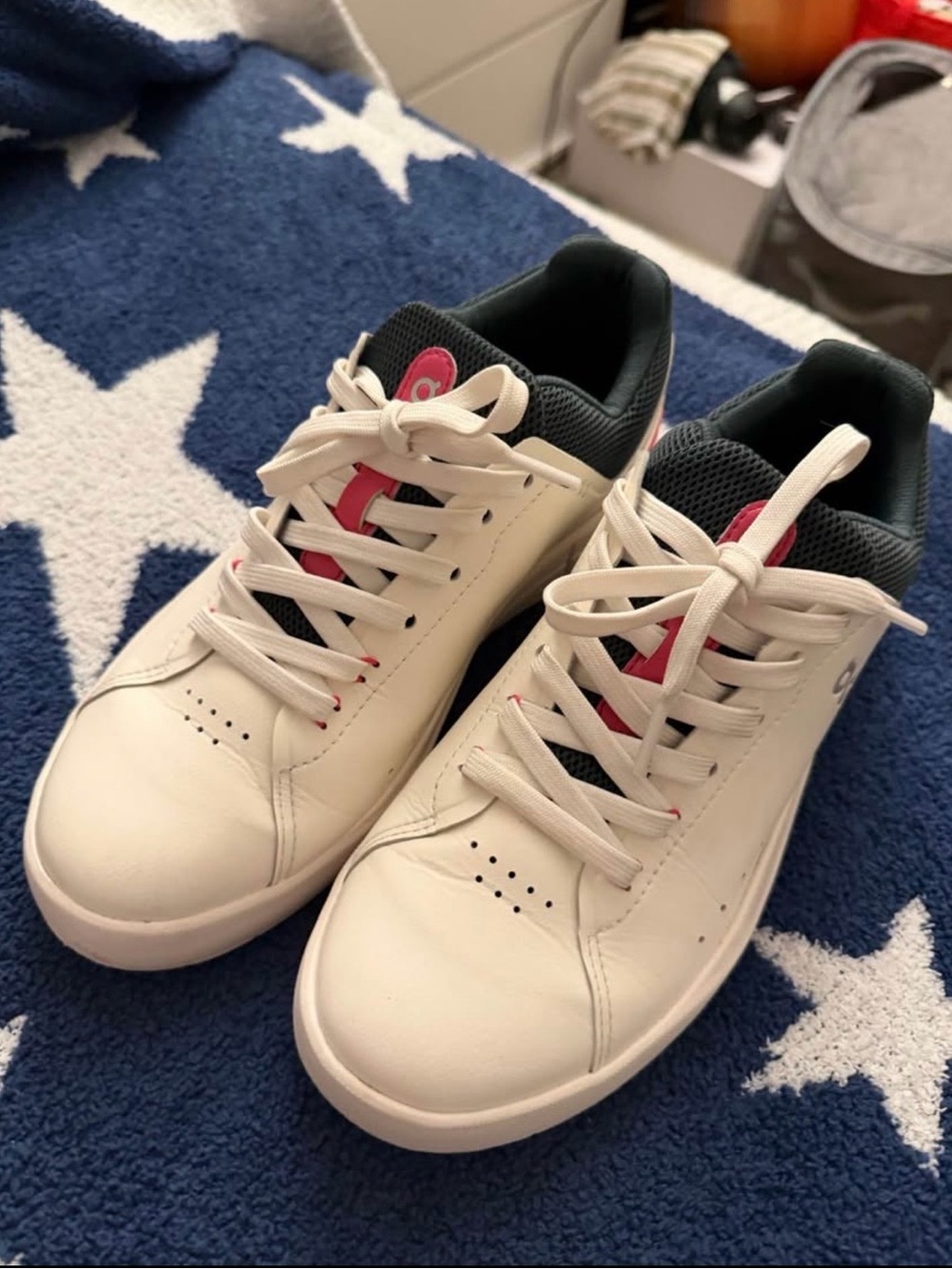 On Running White Sneakers with Pink and Black Accents